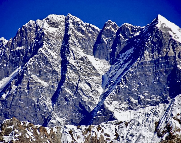 Everest and the gigantic South Face of Lhotse Main, Lhotse Middle and Lhotse Shar from the upper Hongu Valley.