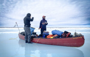 A canoe on a frozen lake in Canada.