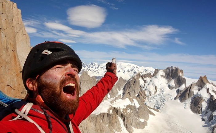 O'Driscoll shouts in triumph, Patagonian spires behind.