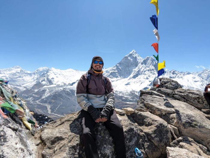 Dr. Joshi with Everest in the background.
