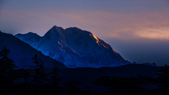 Tirich Mir in blue lights at sunset.