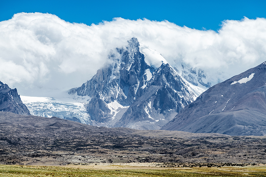 clouds backing the spiky peak of Shisha Pangma.