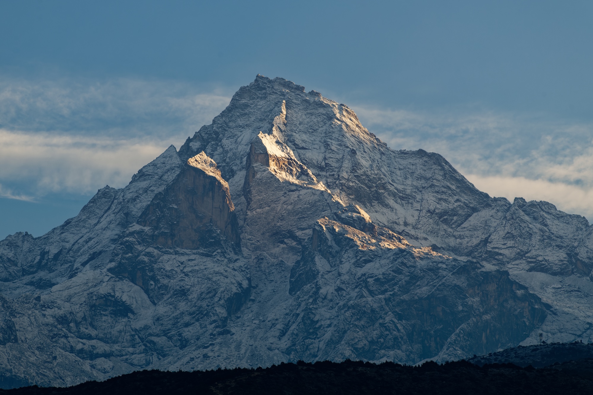 Dawn light hits a peak near Namche Bazar.