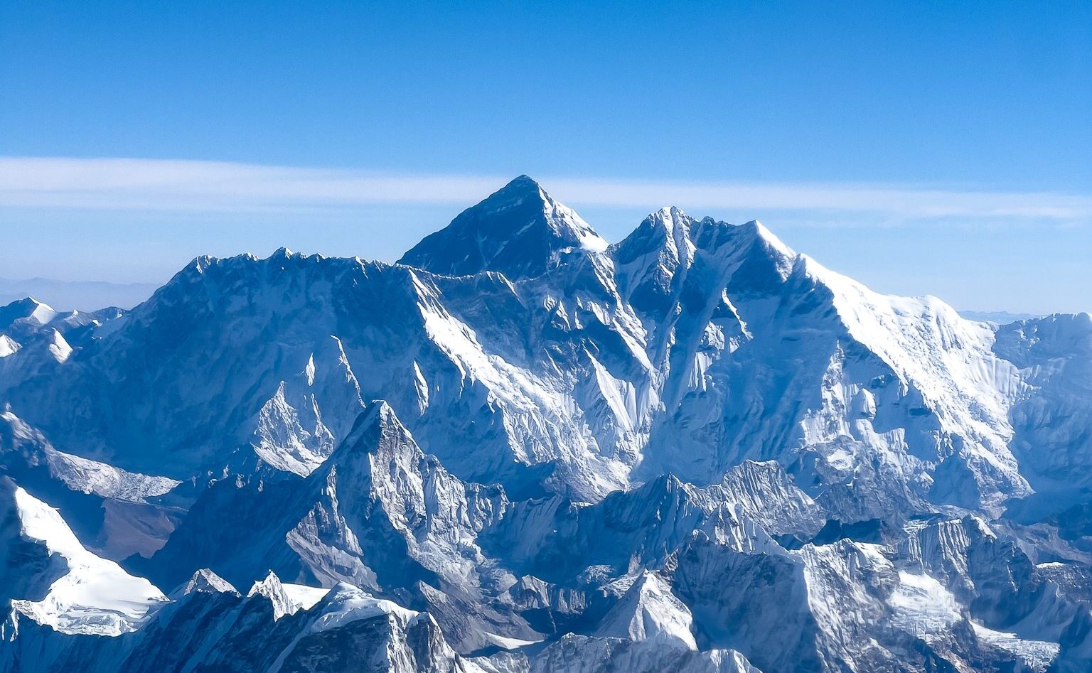 Nuptse, Everest, and Lhotse from the air on a clear day.