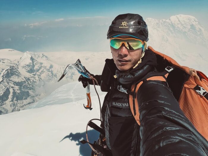 Lakpa Dendi's serfie with an ice axe, helmet and sun glasses. 