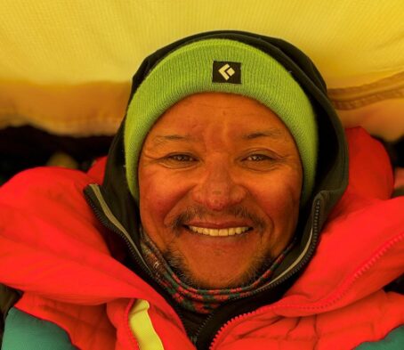Kubatov smiles inside a tent