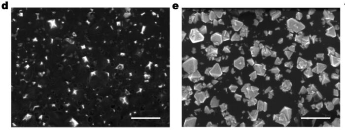 small diamonds in formation against a black background