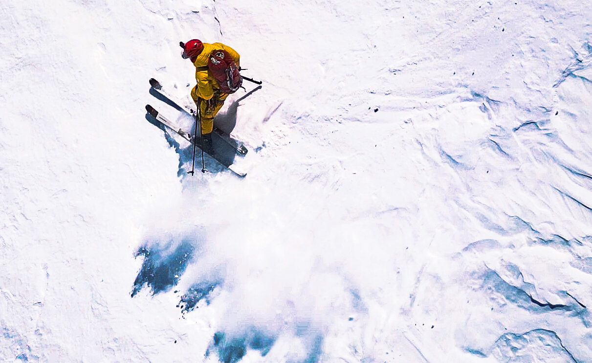 Ziemski on skis on a slope of pack snow