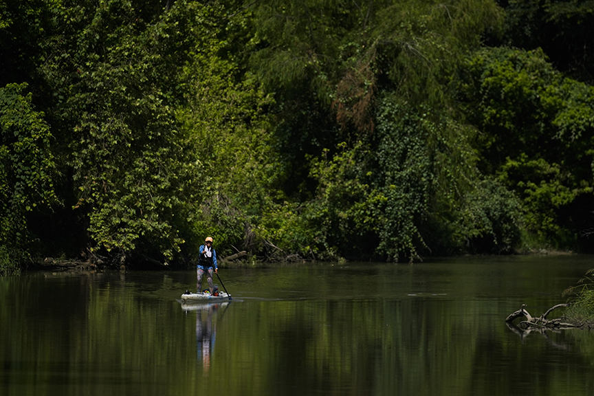 woman SUP'ing on river