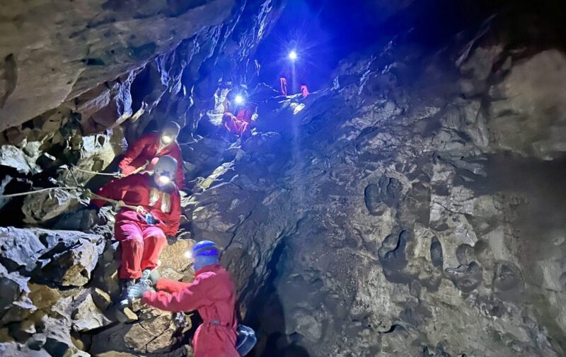 Descending into Rat's Nest Cave.