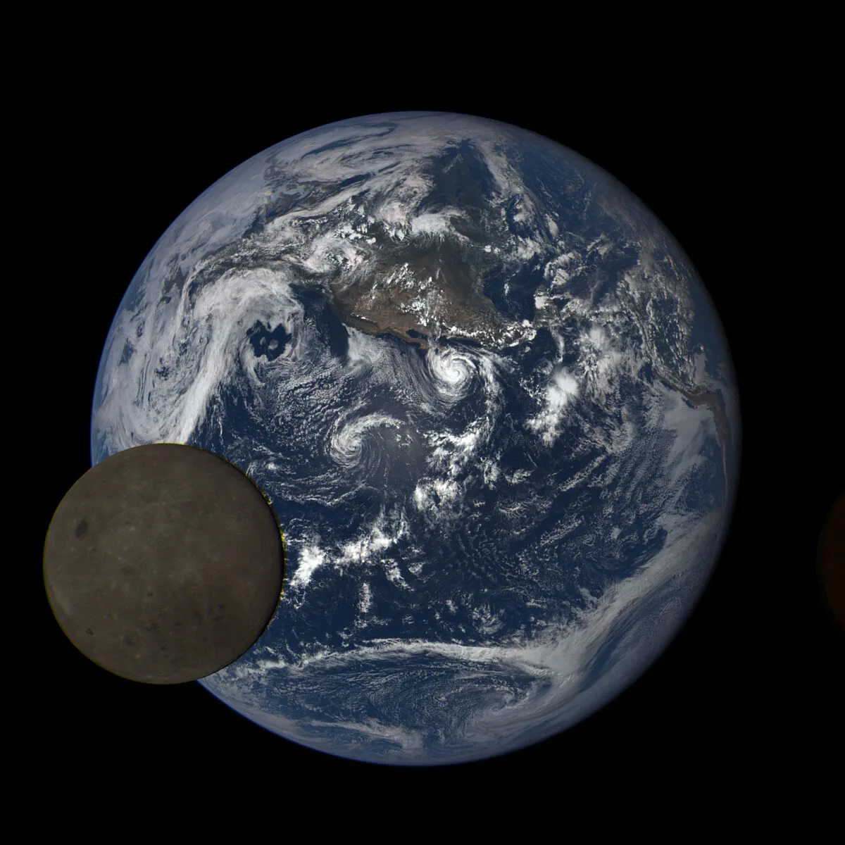 Satellite image showing the Moon passing in front of the Earth. The far side of the Moon is illuminated to the camera.