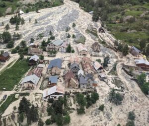 the houses of La Berarde flooded in water and mud