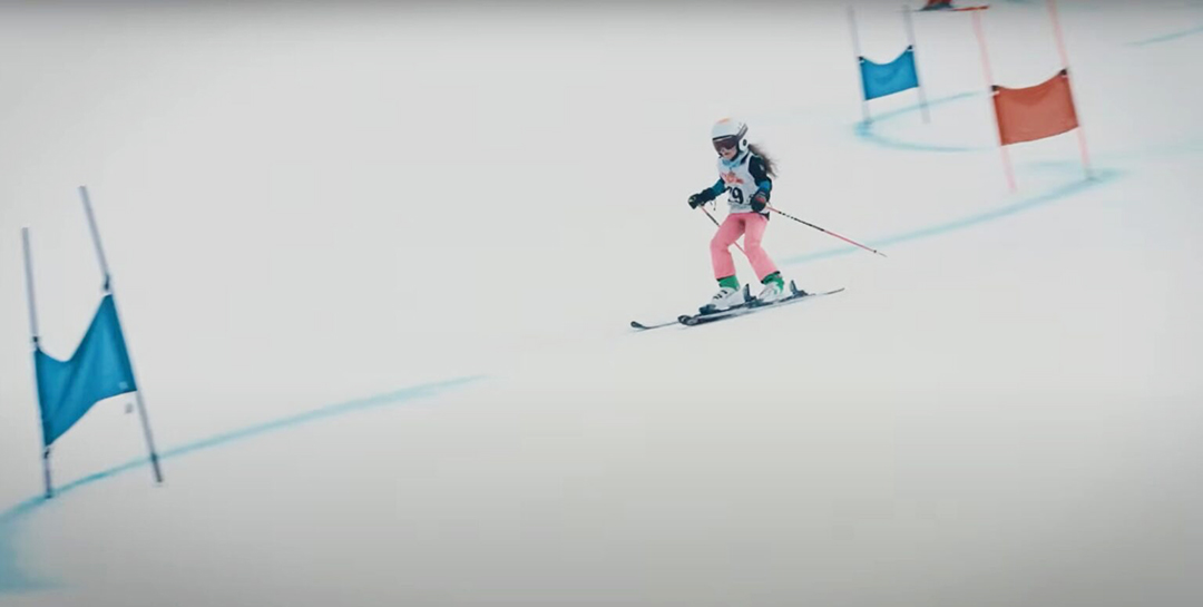 kid downhill skiing