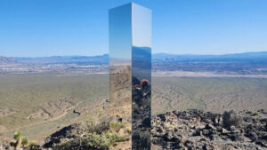 a silver monolith in the desert