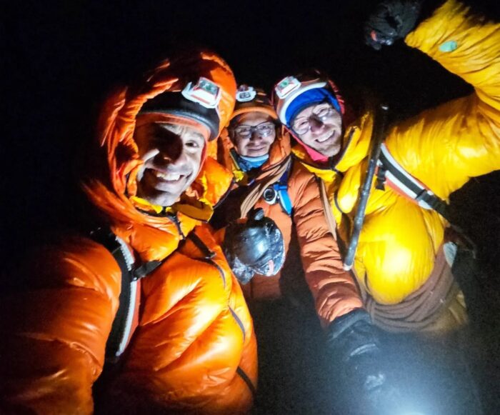 Eneko Pou, Micher Quito, and Iker Pou on the summit of Pisco. 