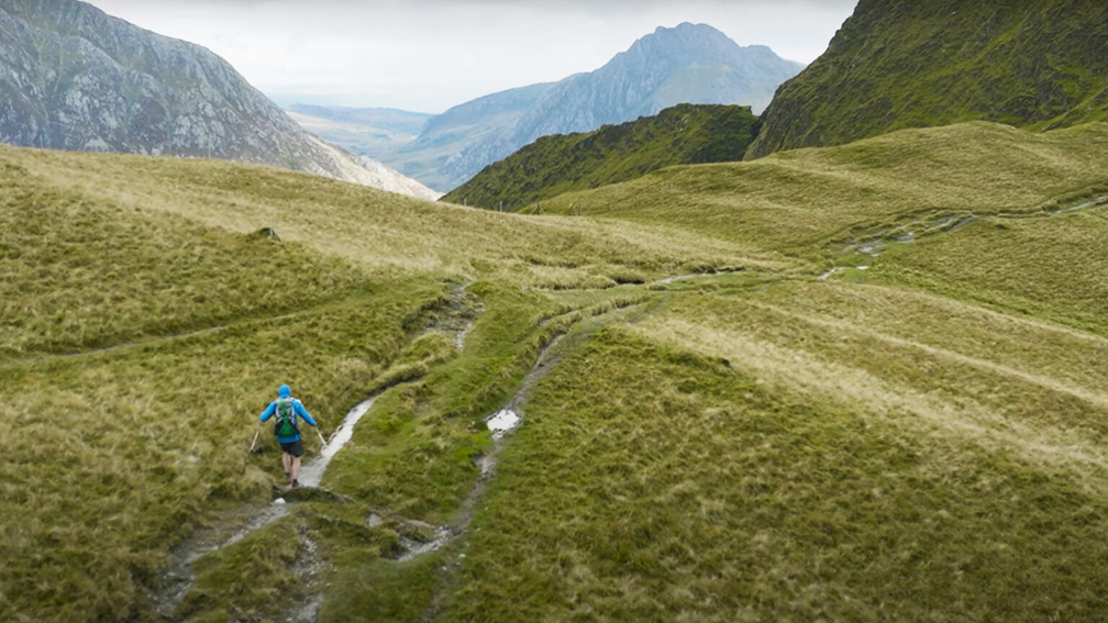 man running on Welsh fells