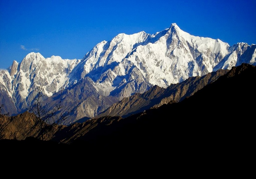 Ultar Sar on the right, Bojohagur Duan Asir on the left. On the far left is Hunza Peak and the distinctive rock needle of Bublimotin.