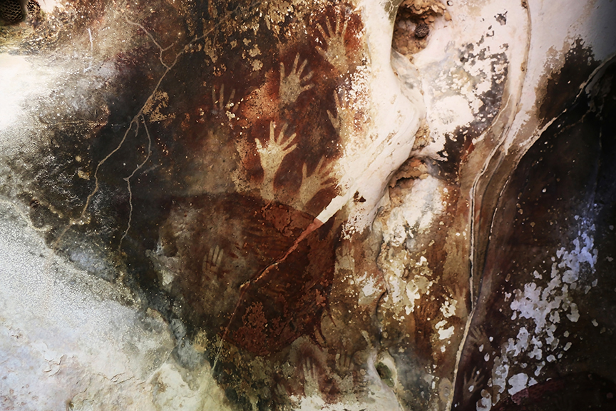 cave art of human hands