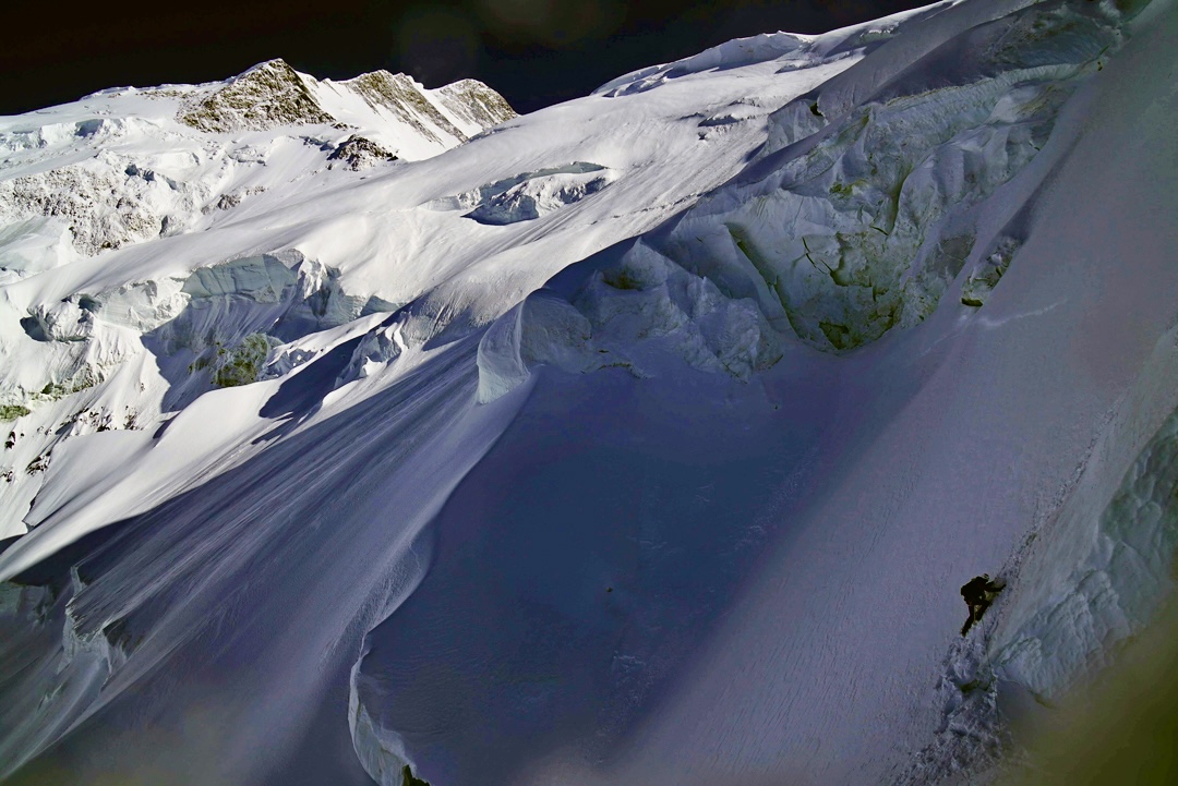 Kazuya Hiraide on the south face of Rakaposhi. The southeast ridge is visible above left.
