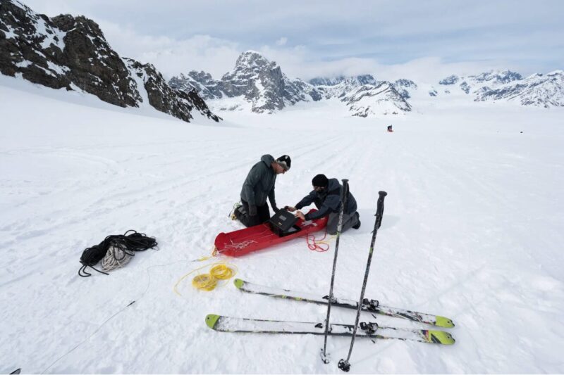 Martin Truffer and Brandon Tober set up the radar system on Ruth Glacier.