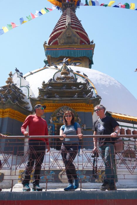 The climbers pose in front of a stupa during a sightseing day in Kathmandu.