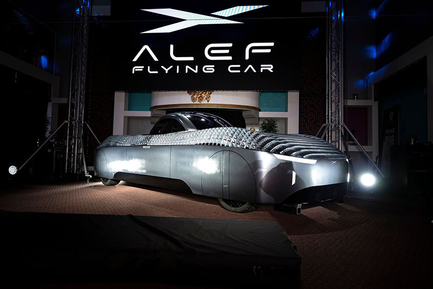 sleek, futuristic flying car in showroom