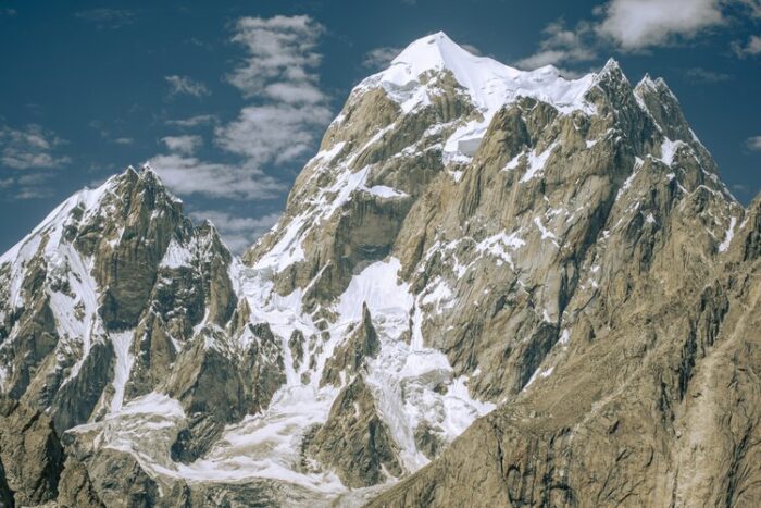 Latok III with rock faces and a snow-capped summit ridge