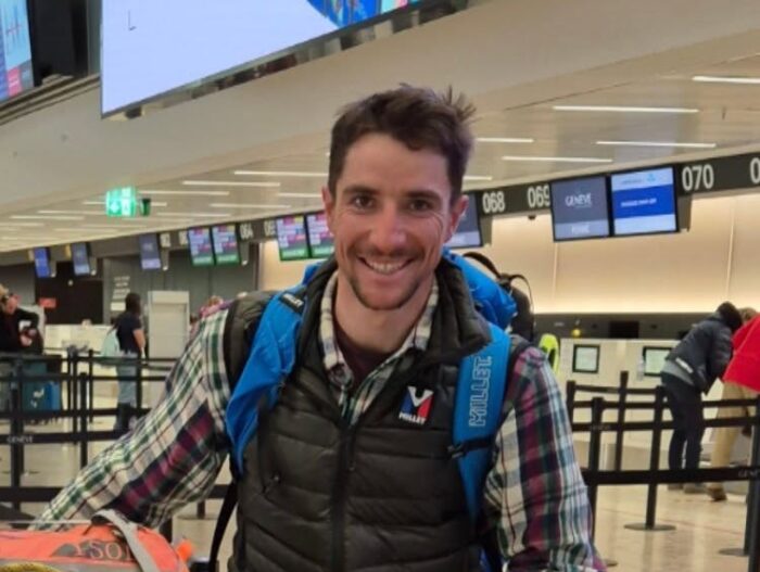 Close shot of Vadim Druelle dressed casually at an airport.