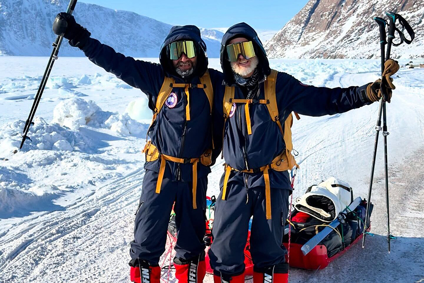 two sledders at end of expedition