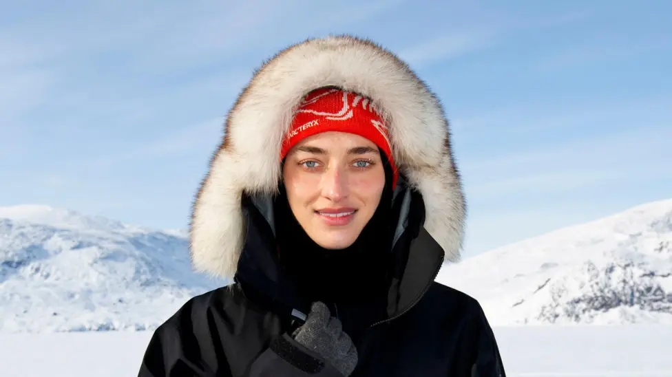 portrait of woman in arctic with fur ruff