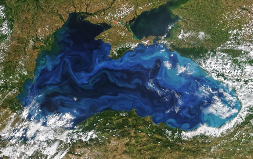 Satellite image of the Black Sea, with different shades of water showing swirling eddies and currents.