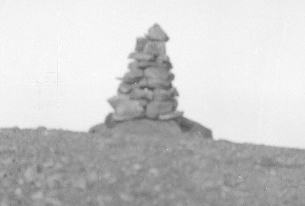 blurry historic image of cairn