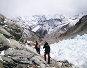 Climbers heading to Camp 1 on Makalu among rocks and penitents.