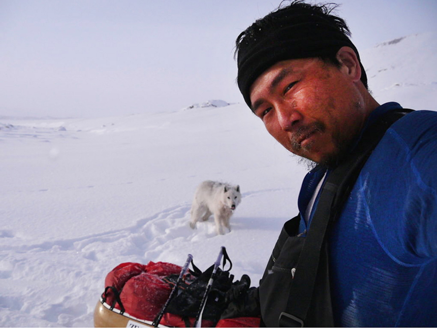 Japanese man with arctic wolf