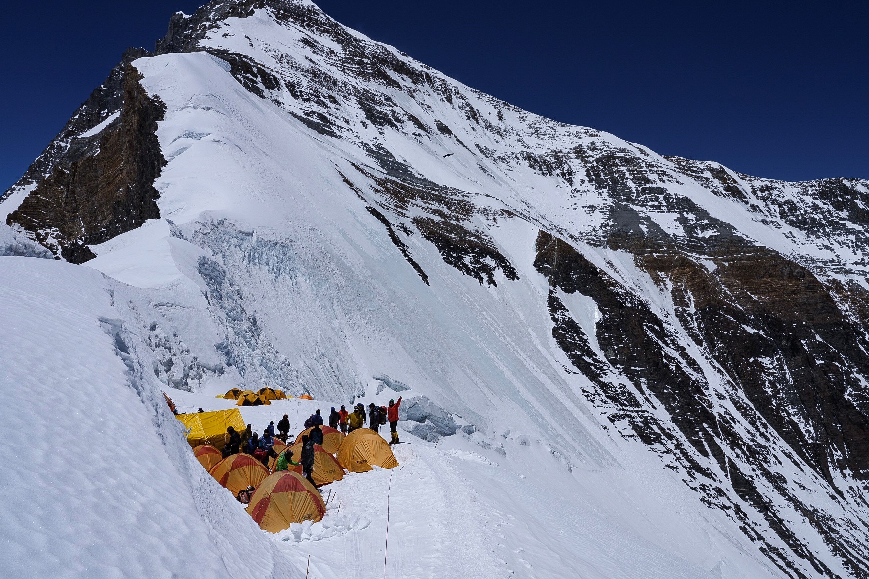 tents pitched close to each other on a snowloaded col on the north side of Everest.