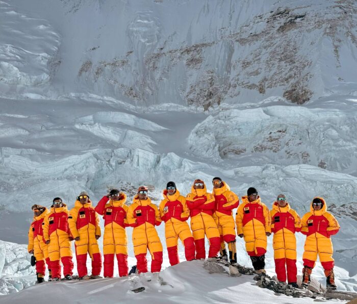 Sherpas in charge of fixing ropes on Everest and Lhotse pose in line