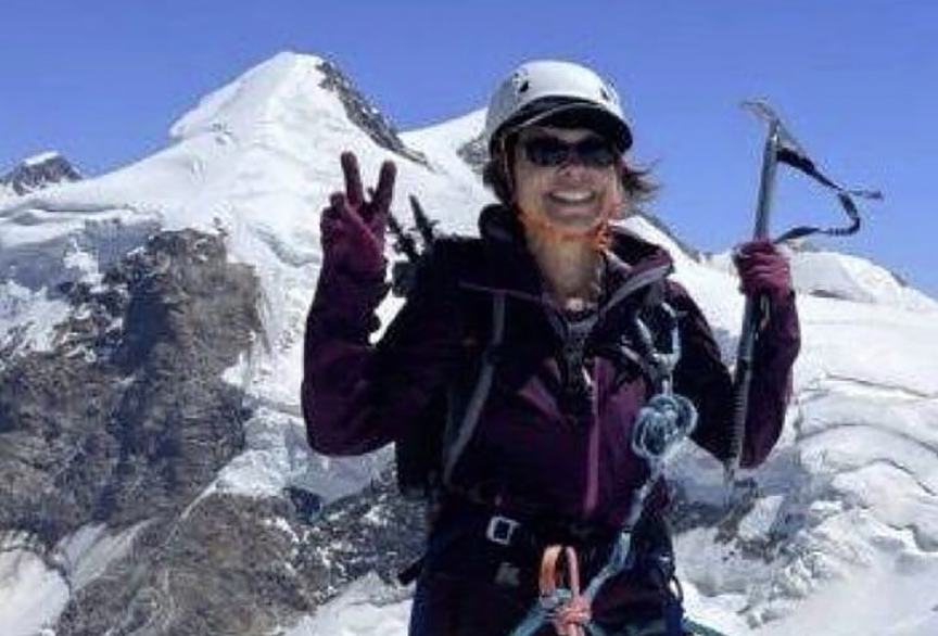 climber gives a V sign