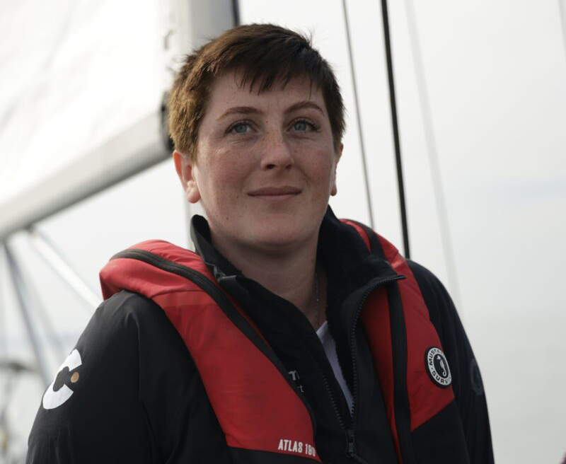 Ella Hibbert on sailboat in life jacket