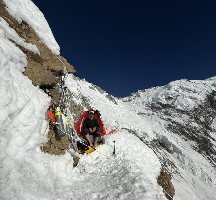Colibasanu in his tiny tent on a snowy ledge on Nanga Parbat. 