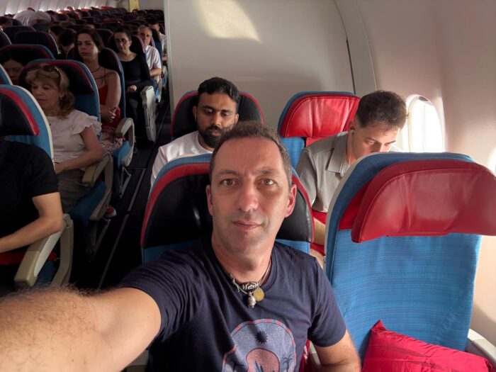 Horia Colibasanu takes a selfie while sitting on a plane to Islamabad.
