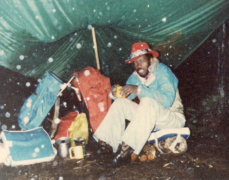 old photo of black man camping