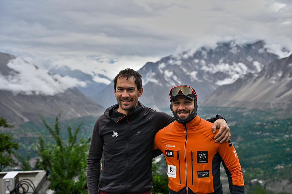 The climbers in fleece jackets while still in the valley.