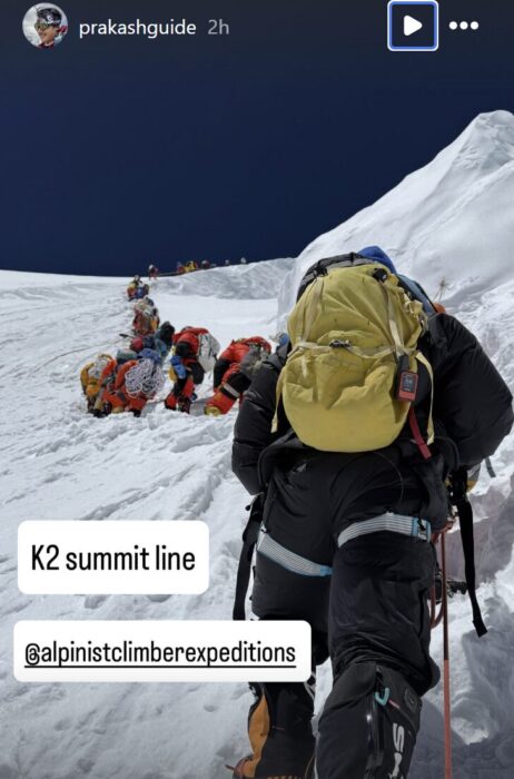 IG Story shows a line of climber up a snowy slope on K2.