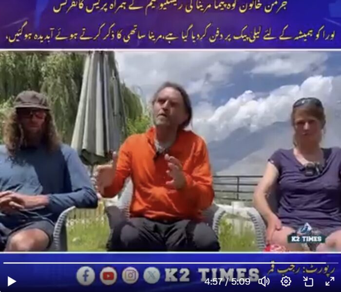 The climbers sitting outside at Skardu. 