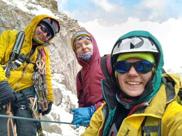 Young female Russian climbers on a mixed face.