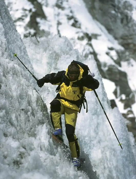 Karnicar ski down a nearly vertical section. 