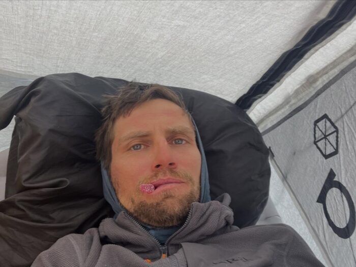 Sieberer takes a selfie from inside his tent.