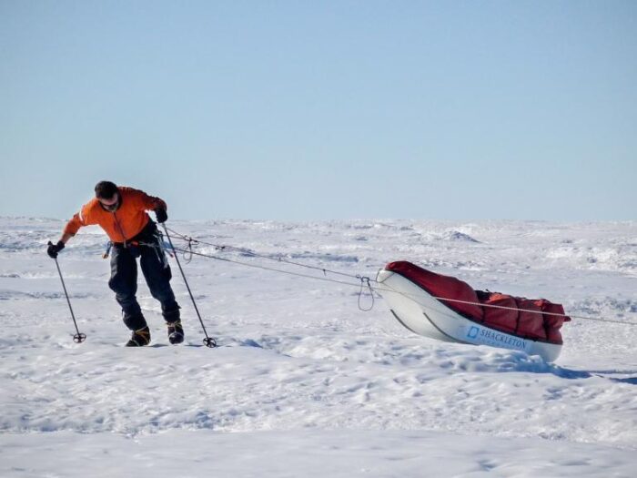 Henry Worsley hauling hard in Antarctica.