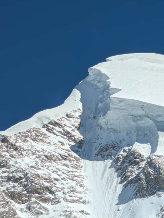 A snow mushroom on a summit ridge. 