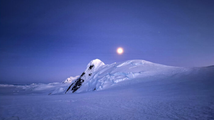 Snowy mountains under the moonlight at th Patagonian Southern Icefield.